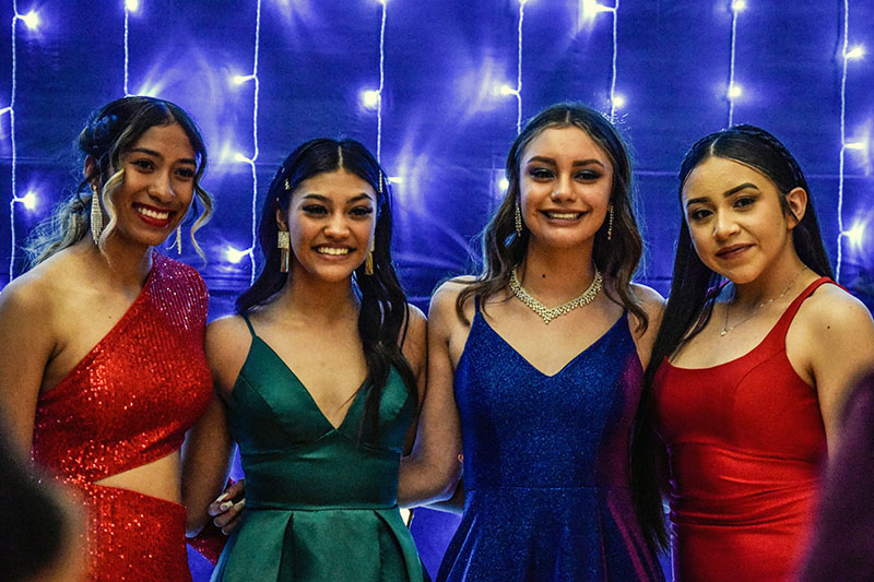 four girls posing for pic