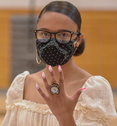 Lady eagles basketball player shows off her 2020 State Championship Ring